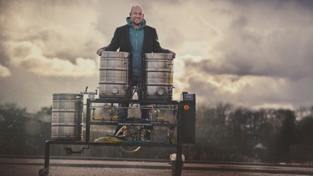 BrewDog co-founder James Dickie with the company's pilot brewing kit, similar tp the kit he first produced brews on
